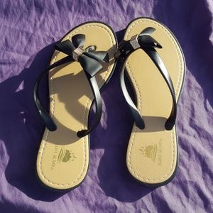 Flip flops with a cute bow